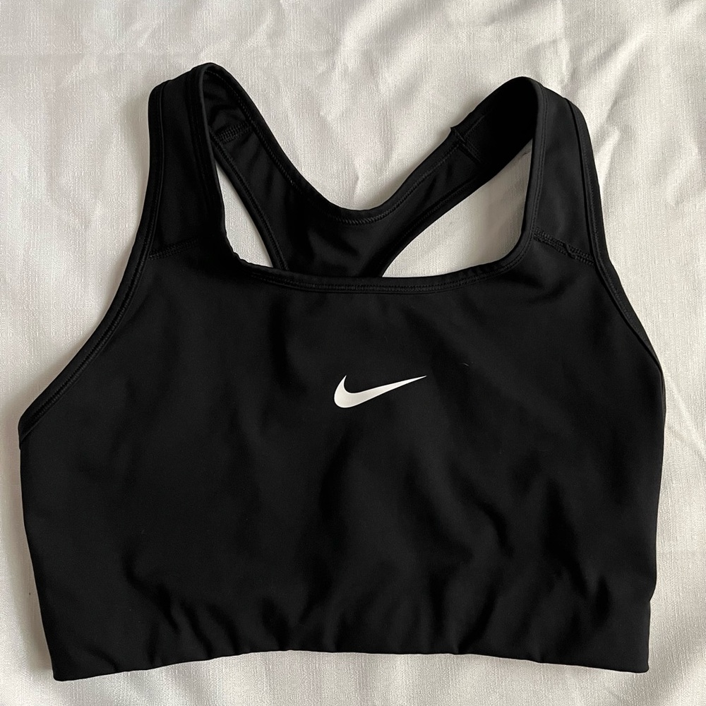Black Nike sports bra with paw print